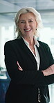 Face, arms folded and mature business woman, confidence and vision for career as financial executive. CEO, investment manager and person thinking in corporate office, smile and portrait in Uk