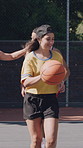 Running, friends and people with basket ball on court, outdoor activity and training for team game. Fitness, smile and group with equipment for dribbling practice, exercise club and play together