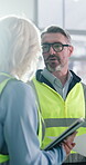 Architect, team and discussion in building with tablet, project planning and property development. Flare, mature people and architecture conversation on site with tech, remodeling update and advice.
