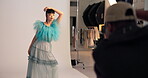 Fashion, photoshoot and model in studio with pose, production or shooting in creative process. Collaboration, people or photographer with equipment, style capture or progress in filming coordination.