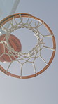 Below, net and shooting basketball in sports game with skill issue, fail and error for competition. Hoop, rim and fitness contest outdoor with challenge, mistake and poor performance for match loss.