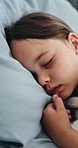 Girl, patient and sleeping on hospital bed for medical treatment, sedation or medication. Asleep, child or kid relaxing with pillow, rest or dreaming for nap, healthcare or monitoring in clinic