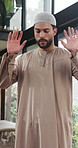 Home, muslim and man with prayer for worship, faith and praise Allah for gratitude on Ramadan Kareem. Islam, spiritual and person in house for praying, dua and salah for holy religion with peace