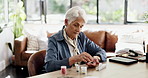 Old woman, pills and drugs storage at house for daily dosage, medicine routine and prescription. Senior person, tablets and container for weekly planner, pharmaceutical reminder and chronic illness 