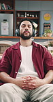 Man, headphones and couch yoga with breathing in home, smartphone and streaming service in living room. Person, smile and listen to meditation music with subscription, sound and mobile app on sofa
