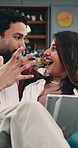 Couple, shock and laugh in home with tablet, funny social media video and bonding together on weekend. Married people, surprise and happy in living room with tech, comedy show and internet humor.