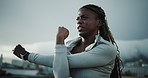 Fitness, preparation or black woman in city with stretch, body mobility or injury prevention in physical activity. Low angle, space or person with start, shoulder or muscle improvement in warm up.