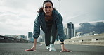 Fitness, woman and start running in city with cardio exercise, wellness or endurance training on road. Active, female person or runner in urban town for sport, beginning or getting ready for workout.