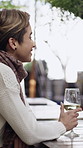 Wine, talking and couple with date at restaurant, storytelling and funny conversation for bonding. Speaking, romance and happy people with alcohol for anniversary, connection and joke for laughing