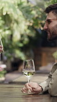 Wine glass, speaking and couple with date at restaurant, storytelling and funny conversation for bonding. Talking, romance and happy people with alcohol for anniversary, connection and joke for laugh