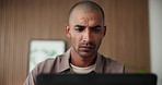 Confused, employee and man with laptop, office and research for campaign on website and copywriting. Reading, mistake and person with tech for info, email marketing and frown for ads on social media