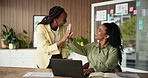 High five, meeting and business women on tech for digital sales, good news and advertising commission. Creative, media agency and people on laptop for success, branding project and campaign budget