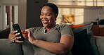 Phone, scroll and happy with black woman on sofa for ebook subscription, relax and contact. Digital reading app, online blog and communication with person in living room of home for weekend break