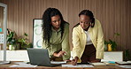 Finance, review or women in office with paper, partnership or discussion on revenue growth. Collaboration, laptop or sales analyst with documents, budget plan or feedback in performance analysis.