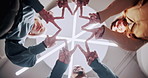 Business people, hands and star with unity for teamwork or collaboration together below in office. Low angle, group or employees with symbol or sign for social cohesion or inclusion in workplace