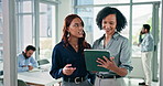 Women, team and talk with tablet at office with report, notes or notification at insurance company. People, broker and smile with tech, application and insight with review at risk management agency