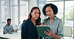 Meeting, feedback and tablet with business women in office for collaboration, discussion or planning. Conversation, advice or review with employee and manager in workplace for project management