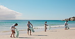Beach, cleaning and group of people with litter, plastic and collect rubbish for recycling. Volunteer, nature and men and women with trash bags for garbage, pollution and dirt for environmental care