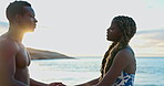 Laughing, couple and holding hands on trip, beach and discussion on summer vacation, love or romance. Outdoor, black man and affection for woman on holiday, sunrise and joke in nature and bonding