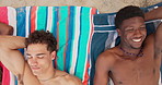 Beach, relax and above of friends on towel on summer holiday, vacation and sunbathing on weekend. Happy, nature and men and women lying on sand for tropical adventure, bonding and hangout together