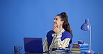 Happy, student and woman with laptop, thinking and preparing for assignment with research in studio. Blue background, reflection and person with smile for ideas, space and planning for exam with tech