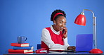 Phone call, laptop and black woman in studio with communication, network or finance contact. Computer, cellphone and African financial advisor on mobile discussion for investment by blue background.