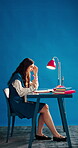 Student, anxiety and woman with notebook, studio and studying with laptop for assignment or research. Blue background, elearning and person with stress for exam, online education and mockup space