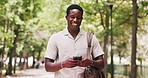Business, funny and black man in city, smartphone for texting and message to contact. Travel, online humor or African person in street, cellphone or digital app for social media, laughing or chatting