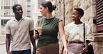 Business, people and walk in city with conversation, coffee break or morning commute for marketing job. Coworkers, smile or journey downtown with discussion, beverage or  travel for advertising work.