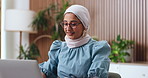 Laptop, reading and typing with business woman in office for finance, online planning or research. Computer, report and smile with happy Muslim employee in financial workplace for wealth management