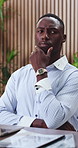 Laptop, thinking or black man in office for planning, forecasting idea or trend insight for investment. Trading choice, profit mindset or investor with pc for risk assessment, typing info or solution