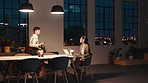 Night, creative agency and women in office, talking and deadline for news report. People, evening and journalist in workplace, greeting and delay for article research, bicycle and modern startup