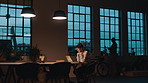 Laptop, night and reading with business woman in office for planning or research deadline. Computer, report and typing with employee person in dark workplace for development or information review