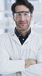 Science, face or man in lab with arms crossed, job or experience in vaccine development. Medical research, portrait or scientist in clinic with goggles, confidence or work in pharmaceutical study.

