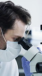 Science, laboratory and man with microscope for analysis, medical research and chemistry. Healthcare, biotechnology and scientist with solution sample for pathology, experiment or forensic PPE