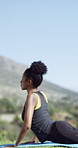 Yoga, relax and woman with stretching outdoor for calm, health or wellness with fitness. Mindfulness, zen and female person with meditation for exercise, spiritual and balance in nature by mountain.