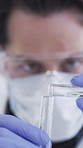 Scientist, hands and liquid in test tubes in lab for drug trial, medical research or chemical solution. Safety, man and pour sample in closeup for science innovation, synthesis or vaccine development