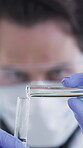 Scientist, hands or solution in test tubes in lab for drug trial, medical research or chemical solution. Safety, man or pour liquid in closeup for science innovation, synthesis or vaccine development