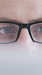 Laptop, glasses and reading with business man for blog update, writing platform or survey results. Vision, audience feedback and media article with closeup of employee in agency for research