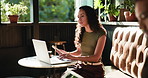 Laptop, phone and remote work with woman in restaurant for communication, planning or research. App, computer and text message feedback with freelance employee in cafe or coffee shop for review