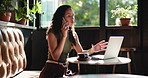 Woman, talking and phone call with laptop at cafe for discussion, planning and contact editor. Thinking, person and freelancer with mobile for conversation, interview source and chat for publication