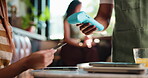Payment, credit card or hands in cafe with machine, eft service or online transfer in pos system. People, customer or waiter with tech, cashless checkout or wireless transaction in electronic banking