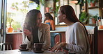 Women, chat and gossip in coffee shop for support, reunion and lunch break. Girls, talking and drink in cafe for bonding, communication and social gathering or hangout with latte in small business