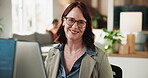 Face, laptop and smile with woman web designer in workplace for development or programming. Computer, design and satisfaction with mature employee in creative office for online project planning