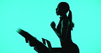 Woman, running and exercise in studio with treadmill, endurance training or cardio challenge for fitness. Active, person and runner with gym equipment, speed workout and wellness on blue background.