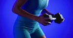 Fitness, weightlifting or arms in studio with dumbbell, power or bicep growth in bodybuilding. Exercise, athlete or woman on blue background with equipment, intense workout or strength in muscle gain