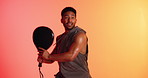 Fitness, padel and man with ball for exercise, concentration and sports training for target practice. Coordination, smile or player with tennis gear for skill development, active or studio background