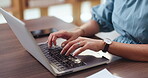 Laptop, typing and hands of business woman in office for account, budget and planning proposal. Market research, online report and review with employee in agency for revenue, profit and funding