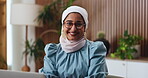 Business, face and laptop with Muslim woman in office for finance, online planning or research. Arms crossed, computer and smile with employee person in financial workplace for wealth management