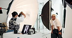 Woman, photoshoot and model in studio for fashion, trendy style and behind the scenes at agency. People, photographer and camera for outfit, clothes and production process with smile for magazine